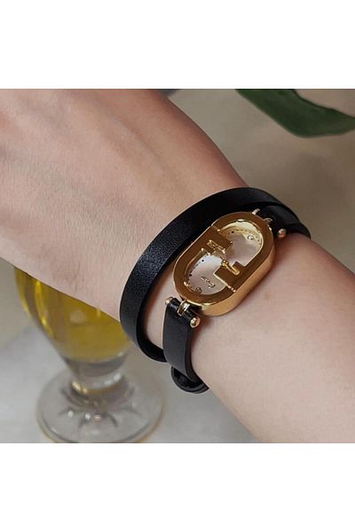 catera Caterra women's watch, black leather, gold frame