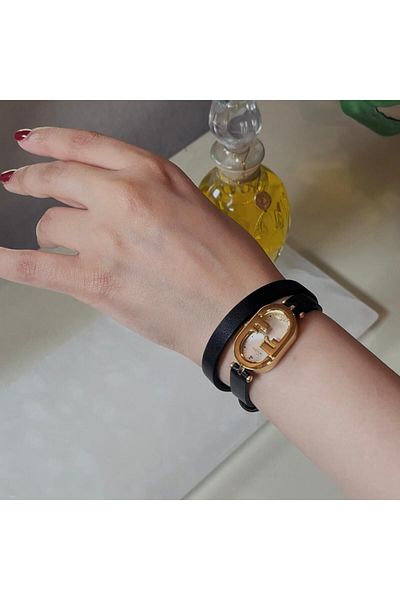 catera Caterra women's watch, black leather, gold frame