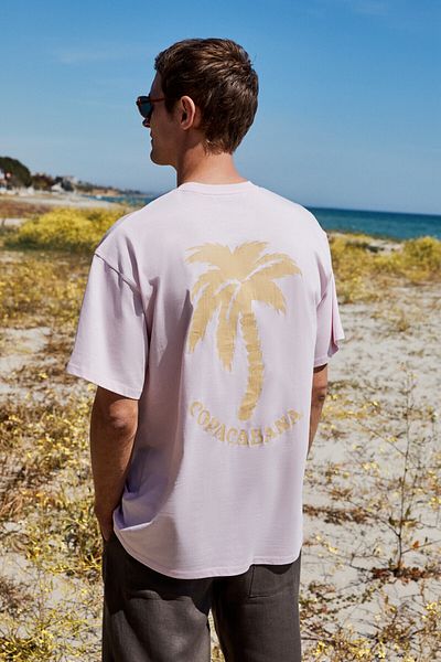 GRIMELANGE Copacabana Men's 100% Organic Cotton Oversized Short Sleeve Pink T-shirt with Front Back Cracking Print Detail