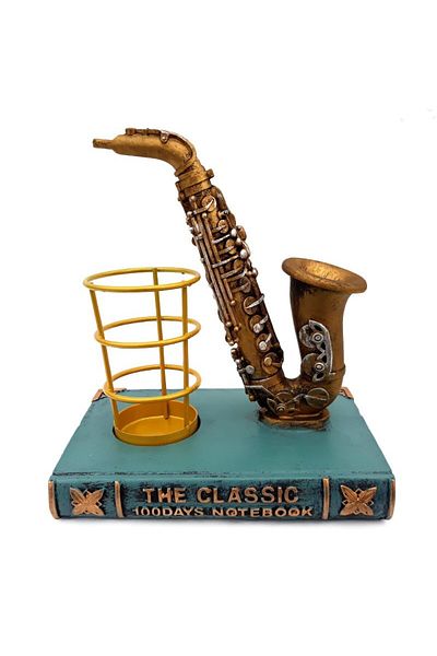 BV Saxophone with pen holder placed on book, Model 1, 629E