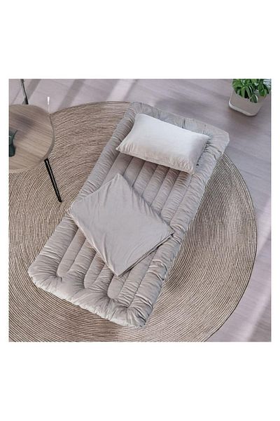 smart home 4-in-1 guest package consisting of a mattress, a light blanket, a pillow, and an elegant bag. Soft velvet package.
