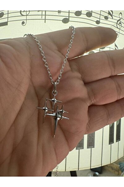 Yuchicly قلادة للرجال والنساء على شكل نجمة بأربعة أطراف - أنيقة، هندسية وروحانية