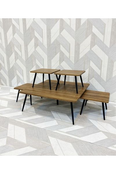 DEC24 A set of serving tables in multiple colors to suit different decors.