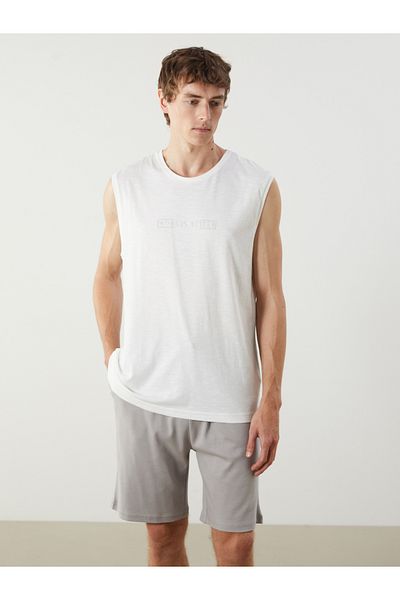 LC Waikiki Bedrucktes Pyjamaoberteil aus gekämmter Baumwolle mit Rundhalsausschnitt für Herren