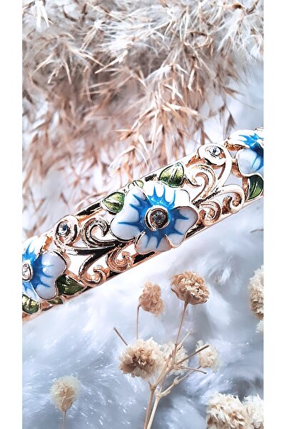 Serenity أصفاد من الفولاذ الذهبي مع شكل زهرة وحجر الزركون