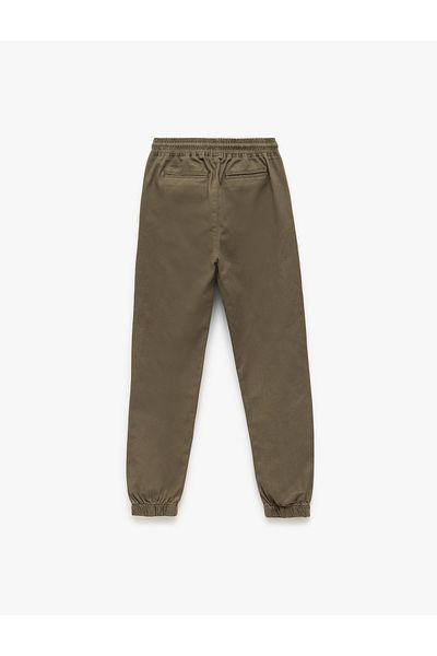 Koton Cotton Gabardine Jogger Trousers with Lace-Up Waist and Pocket Detail