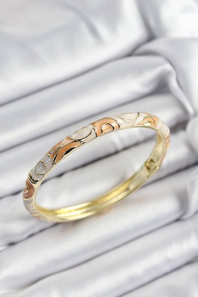 Clariss Bfs Mineli Brass Cream and Baby Mouth Spiral Motif Gold Color Women's Handcuffs