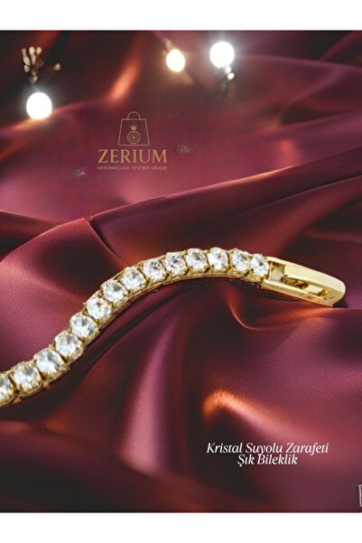 ZERİUM Crystal Waterway Elegance – Stylish Bracelet with Gold Color Detail