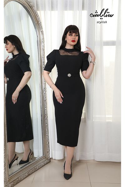 Stylish Elegant black dress decorated with tulle