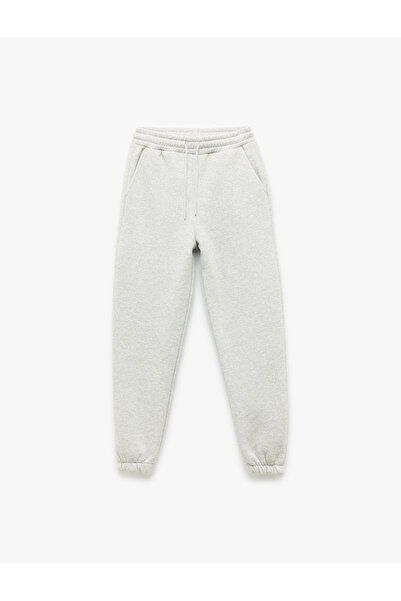 Koton Φούτερ Jogger με ανοιχτόχρωμη τσέπη και άνετη εφαρμογή με κορδόνια στη μέση