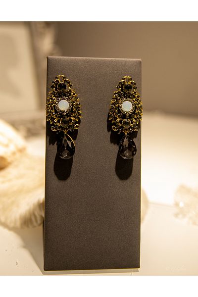 CHARM Gold statement earrings with white opal and black crystals