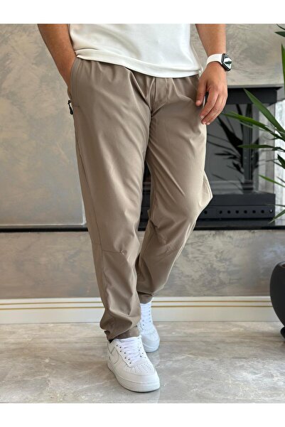 ECARTS Men's Comfortable Fit Zipper Detailed Parachute Fabric Trousers Beige ...