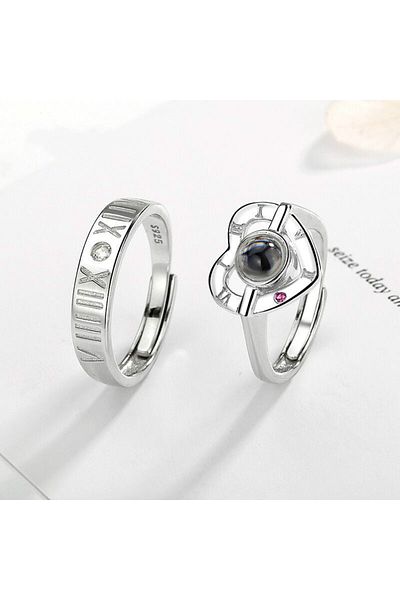 MBrands double ring made of 925 silver that projects the word "I Love You" in 100 languages. heart shape