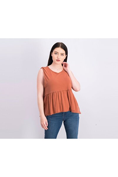 Free People بلوزة نسائية بدون أكمام من القطن بتصميم بيبلوم، من تاوس