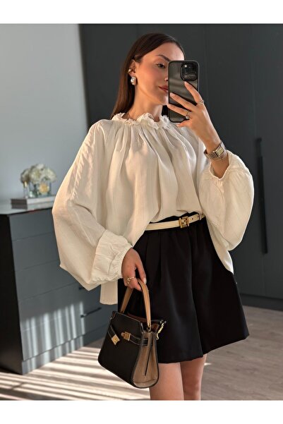 Tugen Co بلوزة مخططة باللون الأبيض اللامع