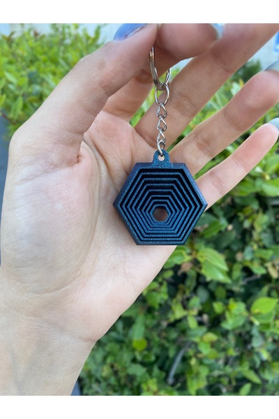 Mee.co سلسلة مفاتيح ذات شكل حلزوني مطبوع ثلاثي الأبعاد