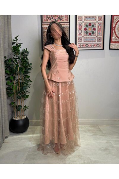 toog فستان نود بينك بتصميم "بيبلوم"