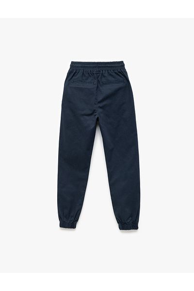 Koton Cotton Gabardine Jogger Trousers with Lace-Up Waist and Pocket Detail
