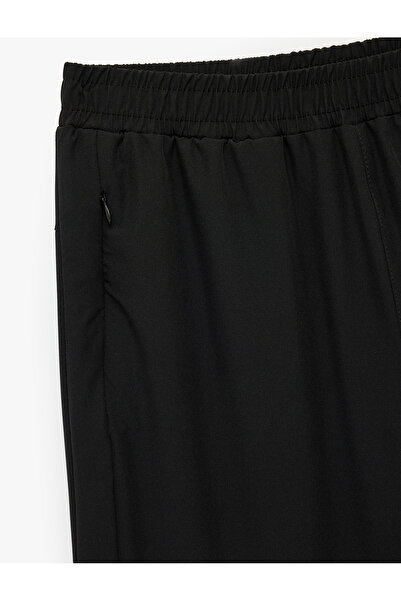 Koton Αθλητικό παντελόνι Jogger με ψηλή μέση, άνετη κοπή με τσέπη με φερμουάρ