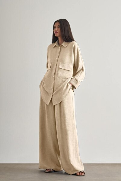 Mizalle Keten Dokulu Beli Lastikli Bej Rengi Bol Kesim Pantolon