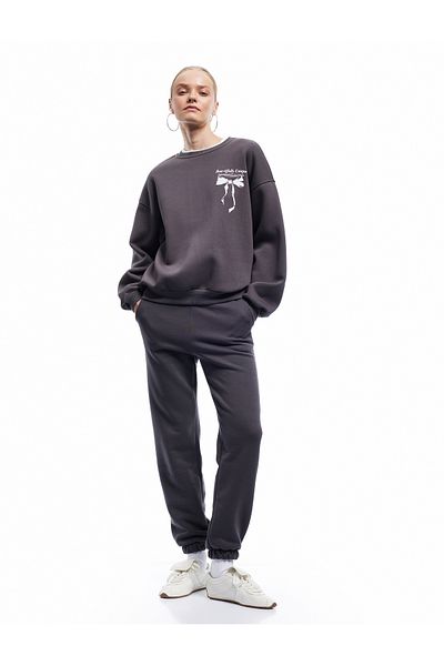 Koton Comfortable Fit Jogger Sweatpants with Raised Pockets and Lace-Up Waist