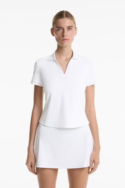 Oysho قميص بولو كومفورتلوكس بأكمام قصيرة