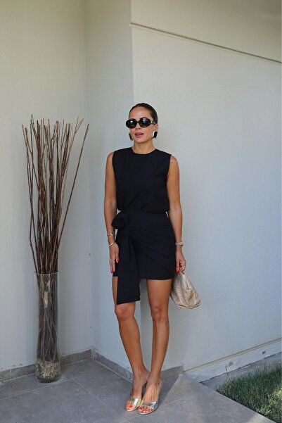 Purple by Banu مجموعة بلوزة تنورة بتفاصيل فيونكة سوداء