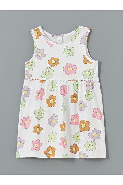 LC Waikiki فستان بناتي من مجموعة إلسيفا باللون الأبيض وياقة دائرية مزين بالزهور