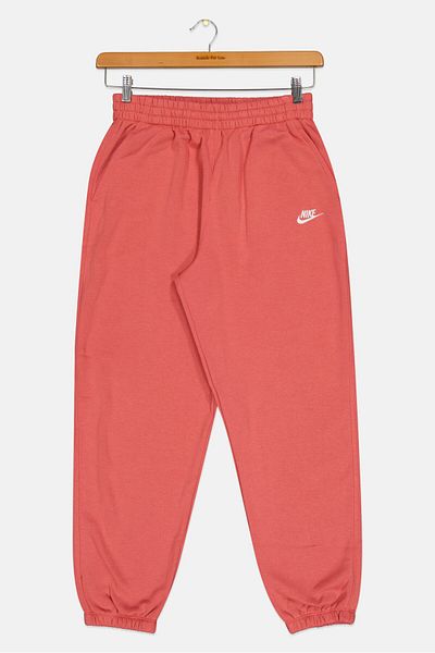 Nike بنطال رياضي فضفاض مناسب للأنشطة الخارجية للبنات، لون خوخي داكن