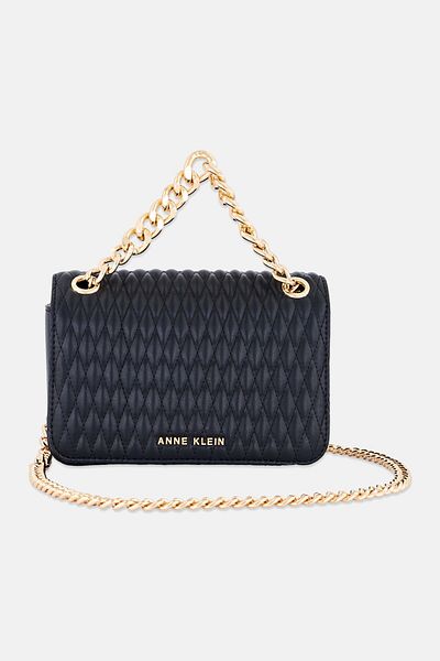 Anne Klein حقيبة نسائية من هاردوير مزودة بسلسلة وشعار، لون أسود