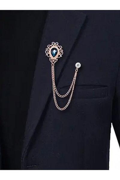 VOLY Brooch with blue crystal and long gold chain