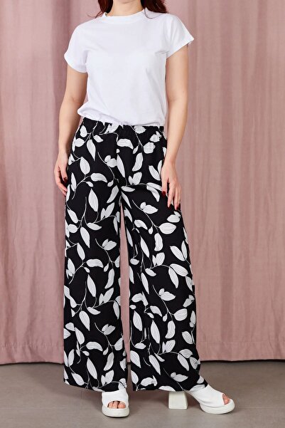 MORESUN بنطال مريح بنمط أوراق الشجر وخصر مطاطي وواسع الساق