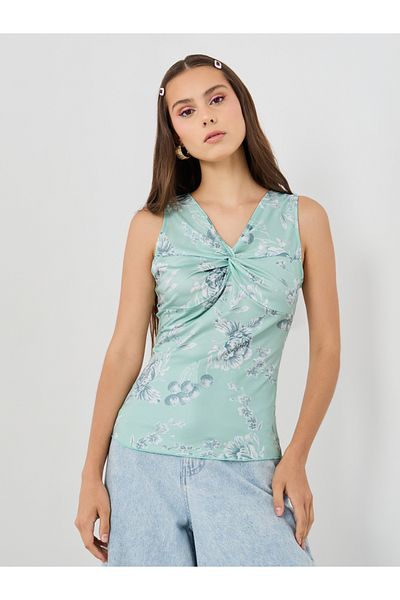 Styli Printed V-Neck Sleeveless Top with Front Twist Detail