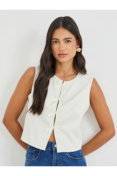 Styli Bow Tie Front Slit Sleeveless Top