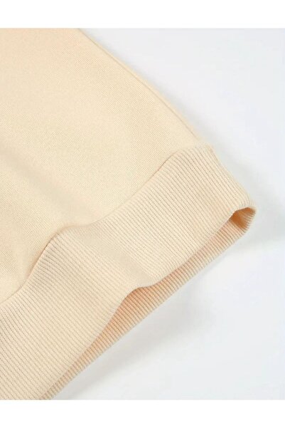 caddekombin Βιβλία Φούτερ με λαιμόκοψη με στάμπα σε μπεζ χρώμα