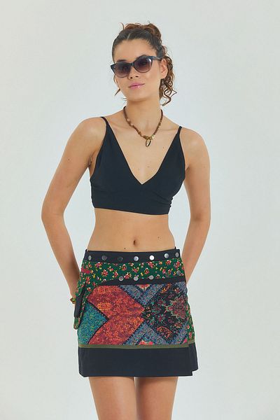 Los banditos Fusta mini cu buzunare cu patch floral