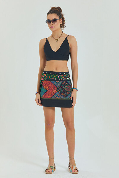 Los banditos Fusta mini cu buzunare cu patch floral