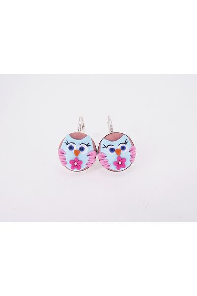Atellier Wearable Art Playful Owls earrings on a silver stand