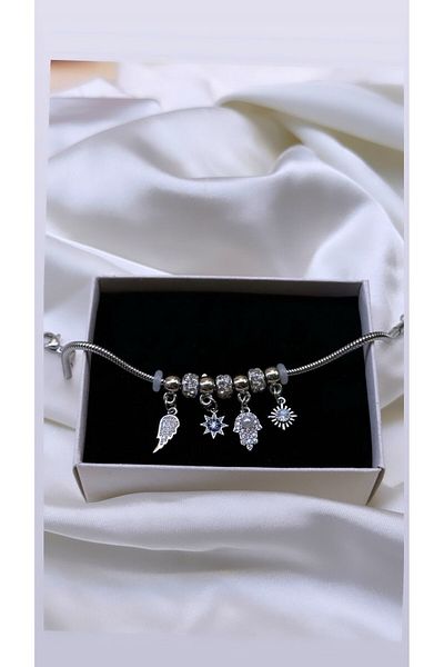 ÖNKÜTAKI Fatma Mother, Wing Charm Bracelet
