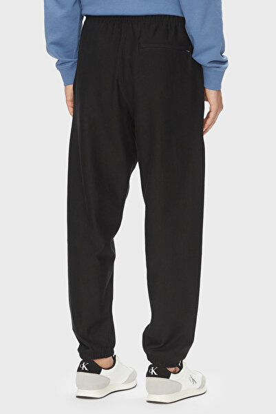 Calvin Klein Pamuklu Regular Fit Lastikli Bel Ribanalı Paça Jogger Pantolon LV04RC279GUB1 Erkek PANT