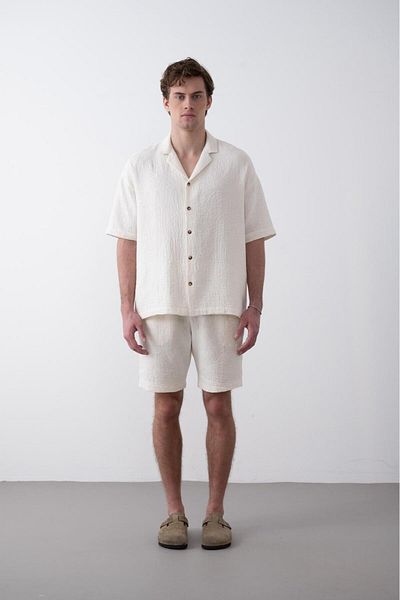 TÜZeMEN Leaf patterned textured short sleeve fabric shirt