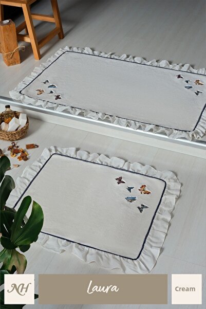 Nazik Home طقم سجادة حمام كريمي مطرز على شكل فراشة من لورا مكون من قطعتين مقاس 60 × 100