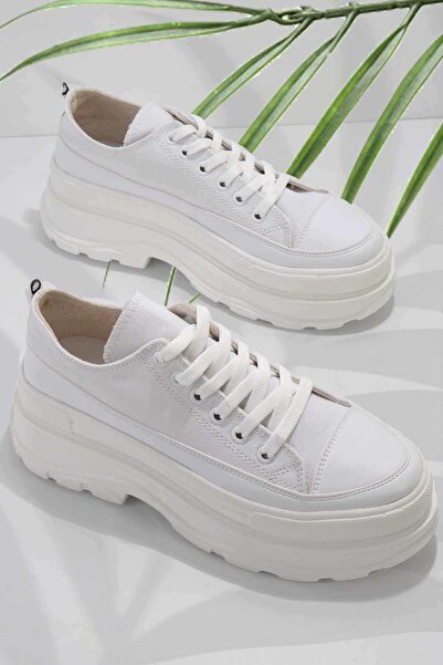 Bambi Černé kožené dámské boty pro volný čas K01531199103