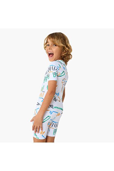Juniors Printed Swimsuit with Short Sleeves and Zip Closure
