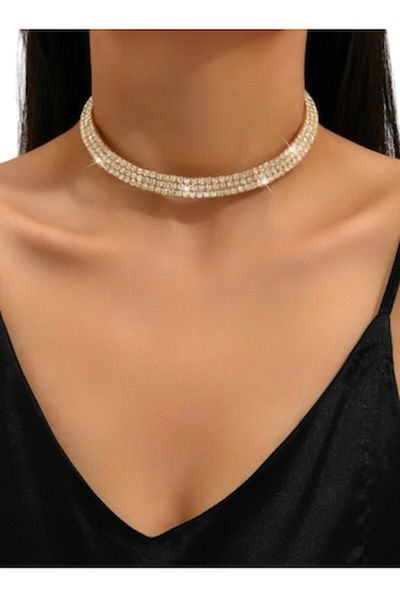 The Casius. Choker fixed with rhinestones, gold color, diameter 38-45 cm, The Casius