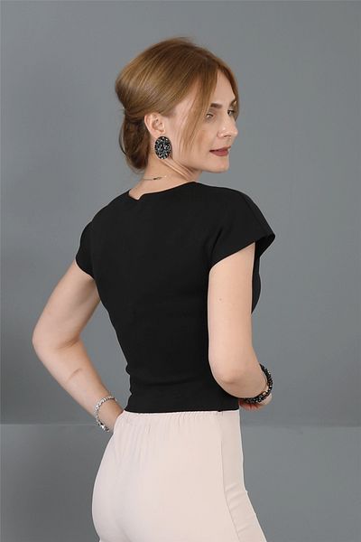 ÖNDER ÖZSOY Mink Flared Trousers