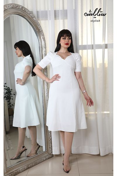 Stylish White midi dress with a soft neckline