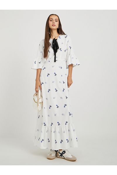 Styli Floral Print Ruffled Hem Maxi Dress with Tie-Up Detail