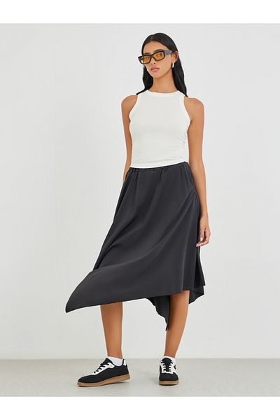 Styli Solid Asymmetric Hem Midi Skirt