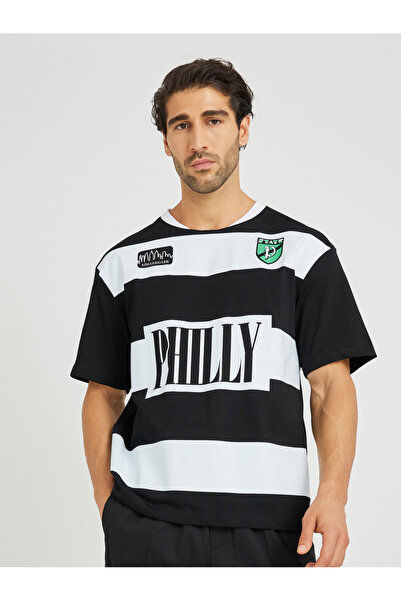 Styli تي شيرت رياضي بقصّة بوكسي من ميكرو بيك بطبعة نصية